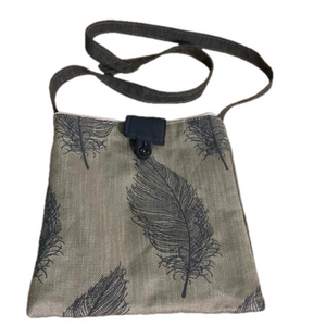 Fabric crossbody purse with feather design